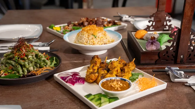 Chicken satay with peanut sauce and fried rice